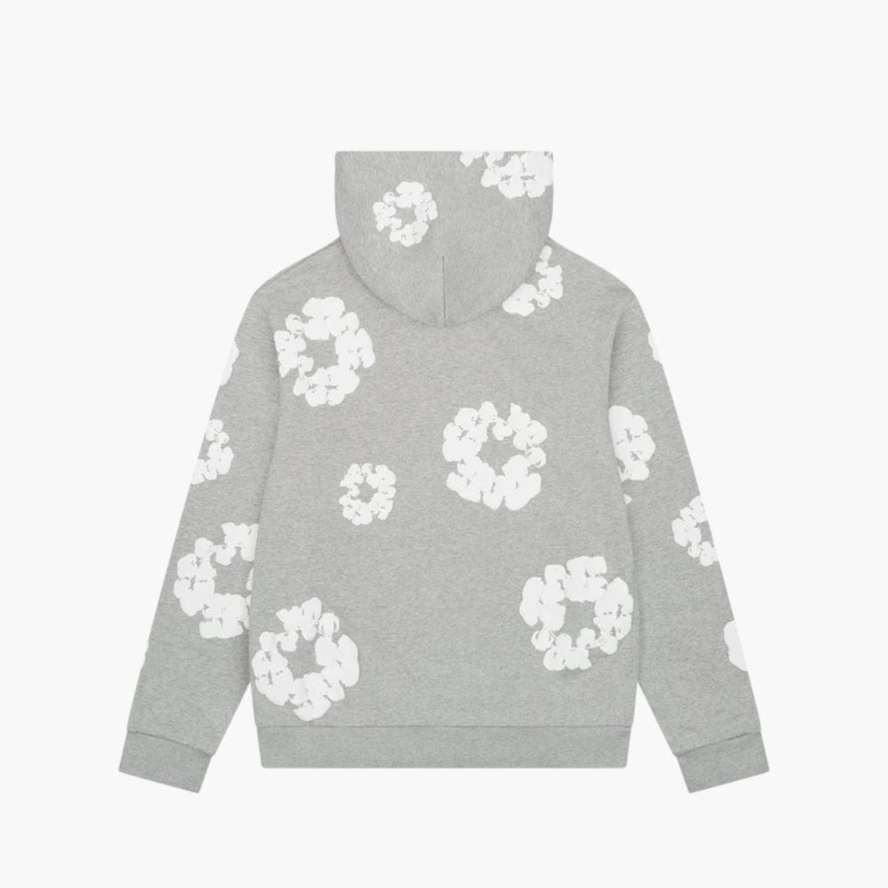 The Gray “Cotton Wreath” Denim Tears Hoodie features a white floral print on a streetwear pullover, inspired by iconic Cotton Wreath patterns across the back, sleeves, and hood.