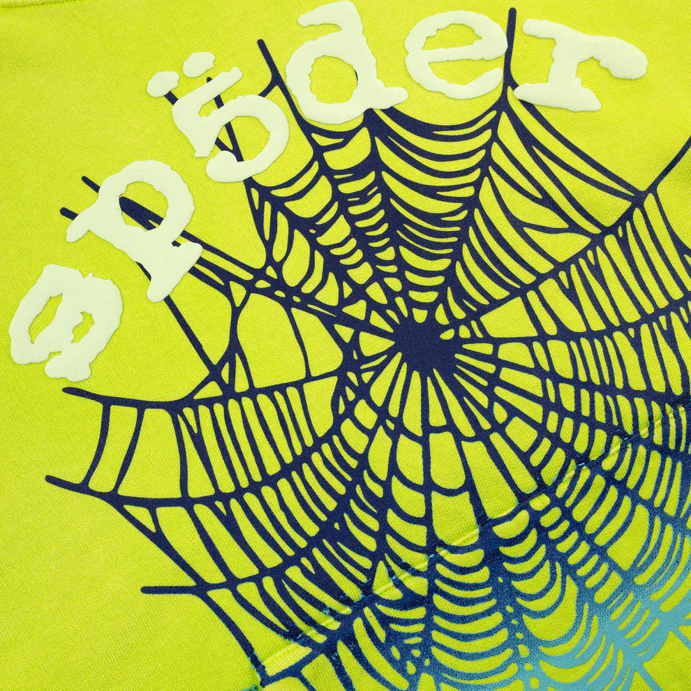 Neon green background with a blue spiderweb graphic and "sp5der" in stylized white text above the web, reflecting the bold vibe of heavyweight streetwear like the Sp5der Web Graphic Hoodie – Neon Green 440GSM.