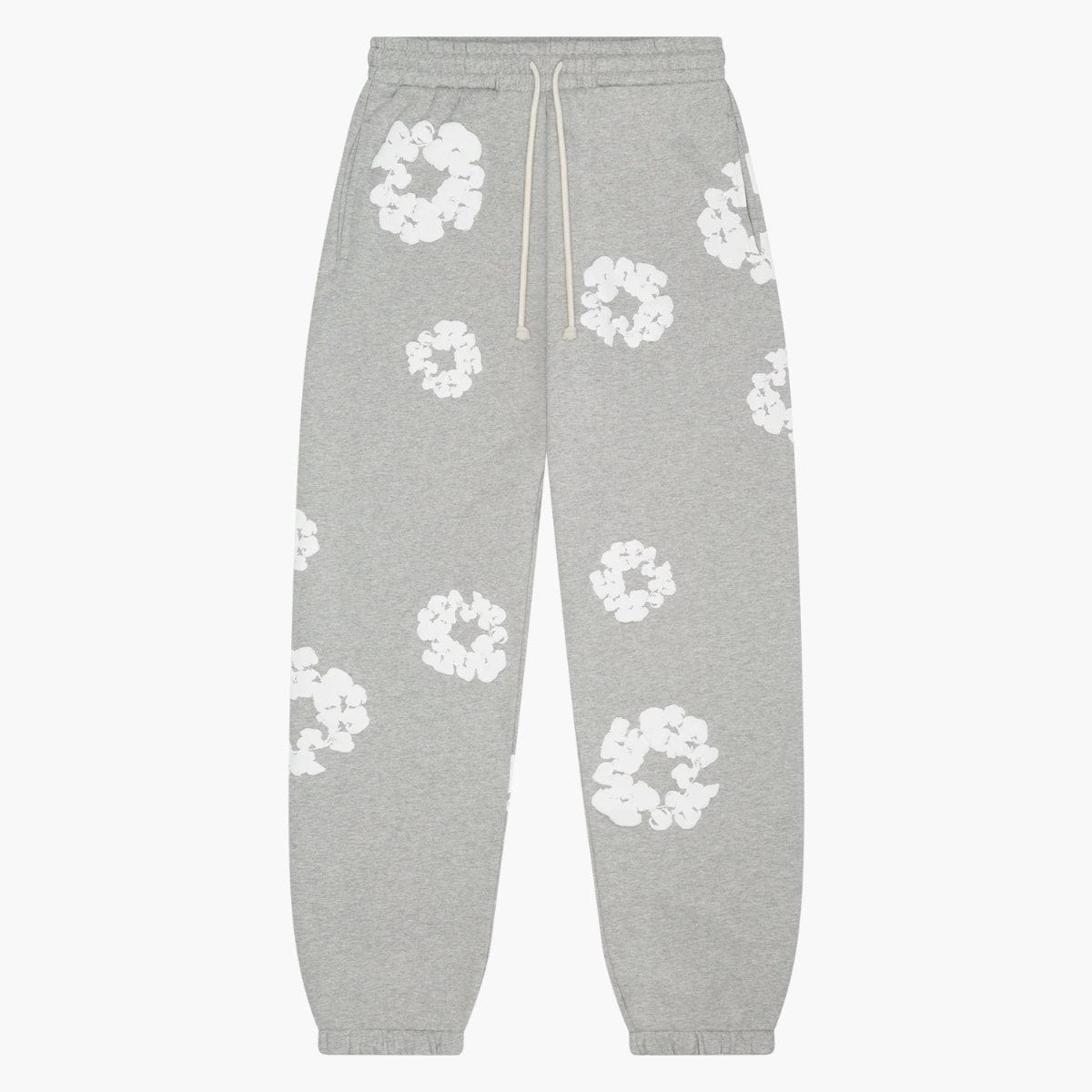 The Grey “Cotton Wreath” Denim Tears Sweatpants feature an elastic waistband, drawstring, cuffed ankles, and white floral prints—ideal for grey streetwear looks inspired by classic Denim Tears style.