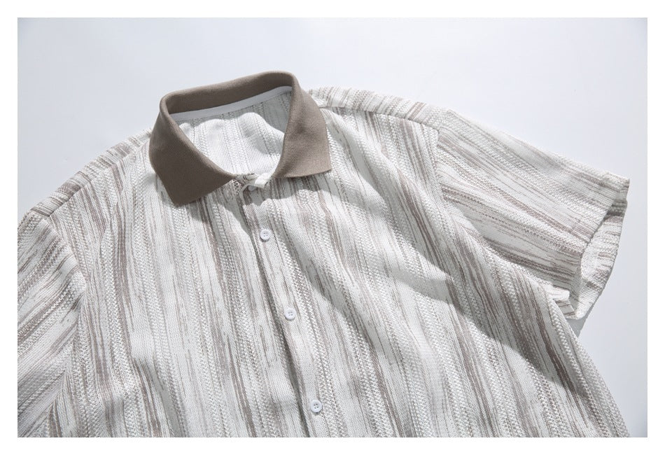 Cropped front view of a cream and taupe striped short-sleeve button-up shirt with a taupe collar.