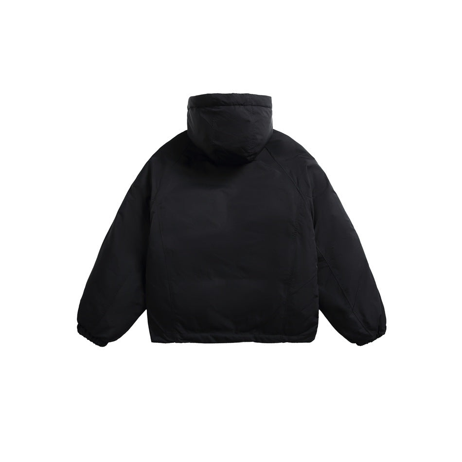 Back view of black hooded jacket flat lay showing paneled seams, raglan sleeves and elastic cuffs