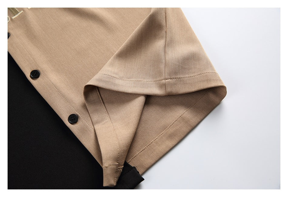 Close-up of a tan shirt sleeve hem and black buttons along the placket.