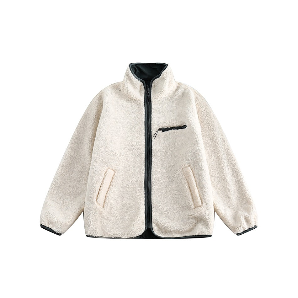 Front view of an ivory sherpa jacket with a black full-length zipper, stand collar, and zip chest pocket.