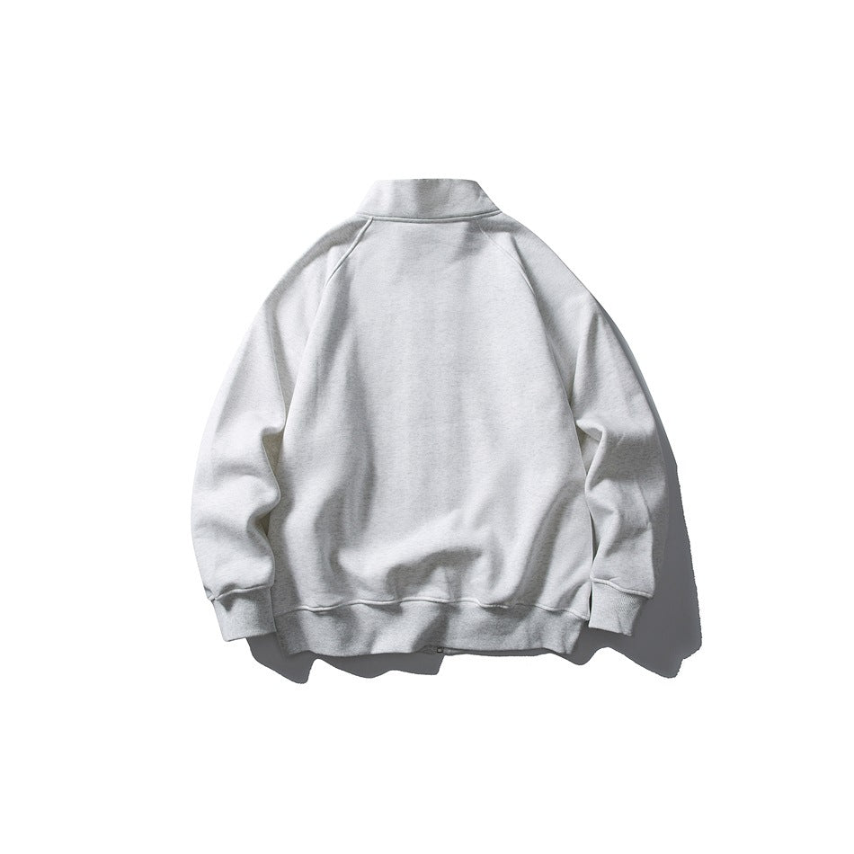 Back view of a light gray zip-up jacket with a stand collar and long sleeves.