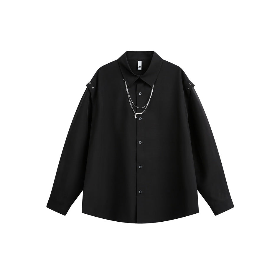 Black long-sleeve button-up shirt with pointed collar, eyelet shoulder straps and layered silver chain, flat front view