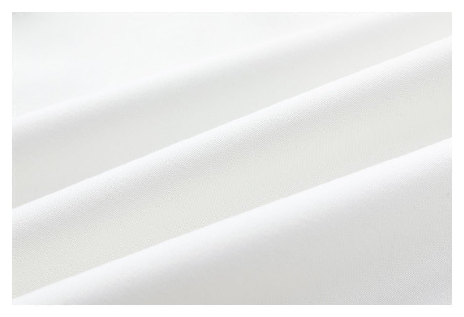 Close-up of the smooth white sweatshirt fabric.