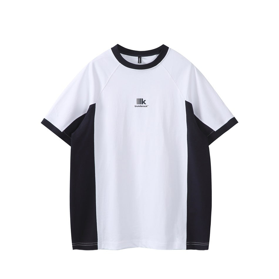 White short-sleeve raglan T-shirt with navy collar, cuffs and side panels, flat front view with small chest print
