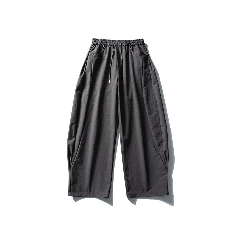 Dark gray wide-leg drawstring pants, front flat lay, with elastic waistband and side pockets