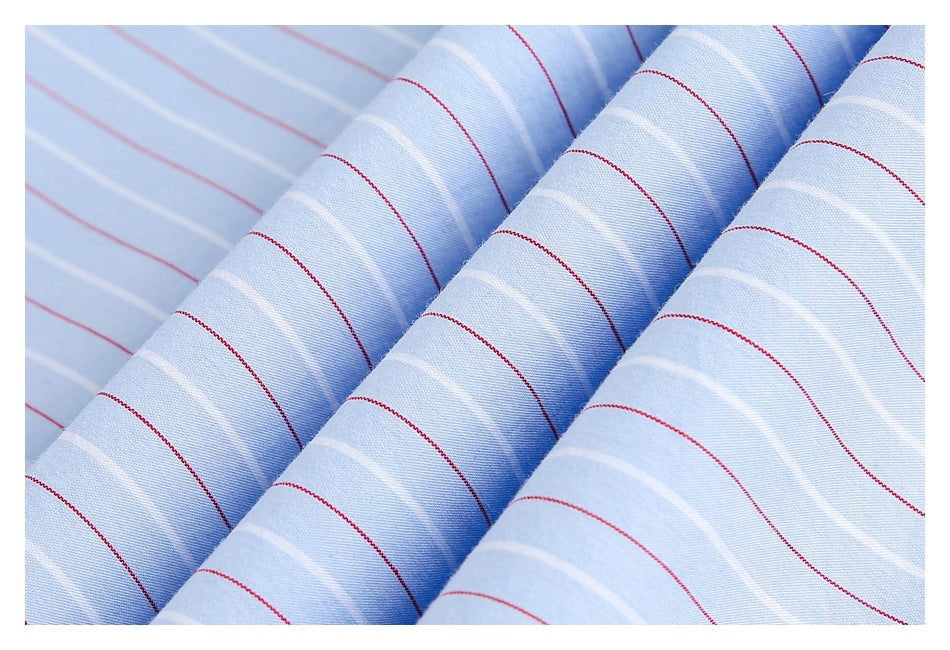 Close-up of light blue fabric with thin red and white stripes, draped in soft folds.
