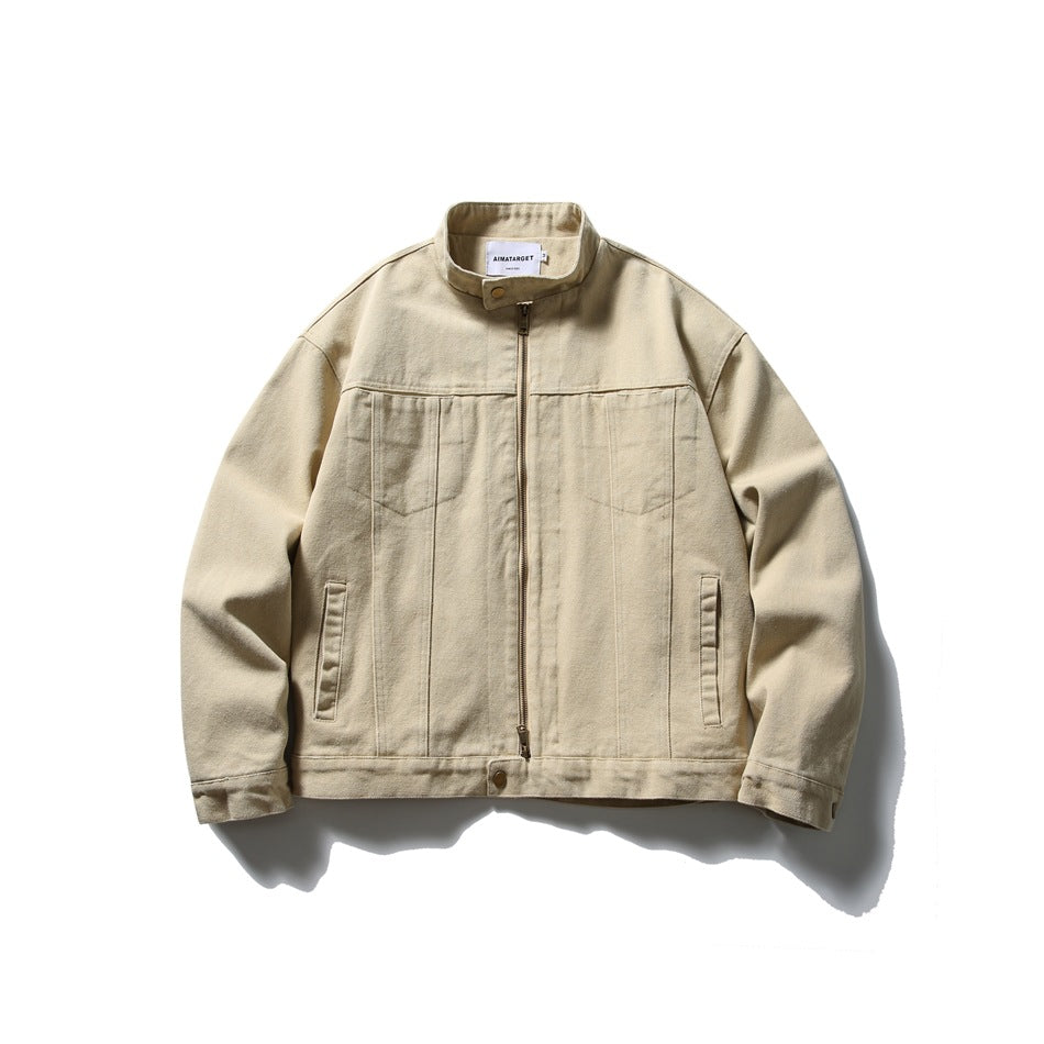 Beige stand-collar zip-front jacket with chest seam panels and side slip pockets, flat lay front view