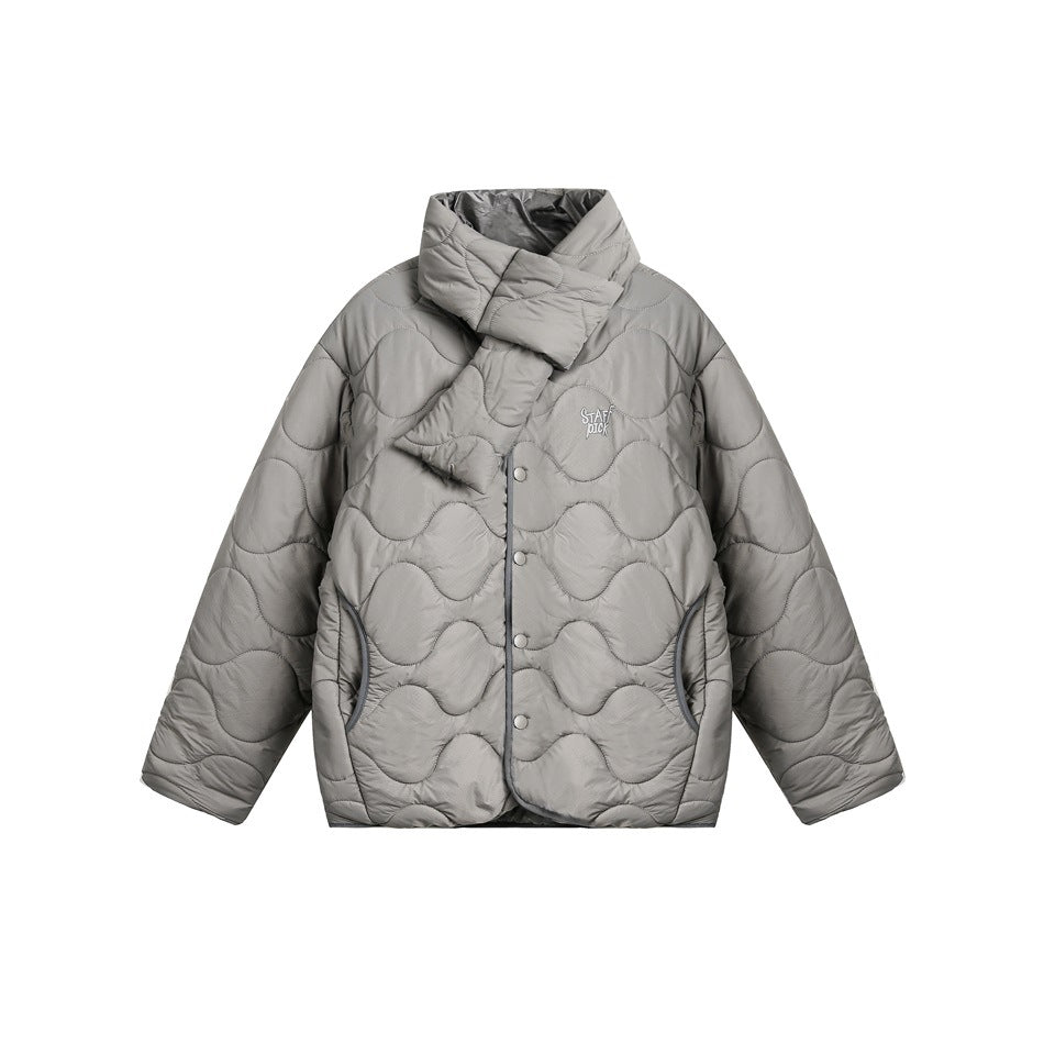 Gray quilted jacket with wavy stitching, snap front, side pockets and a scarf-style neck piece, flat lay