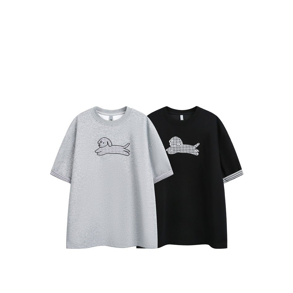 Light gray and black T-shirts shown together, each with a dog graphic and checked sleeve cuffs.