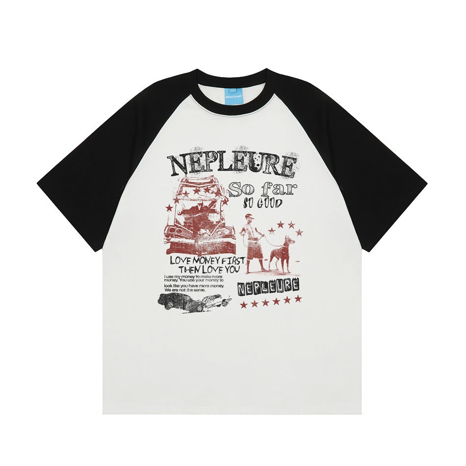 White raglan T-shirt with black sleeves and collar and a vintage car and dog graphic on the front