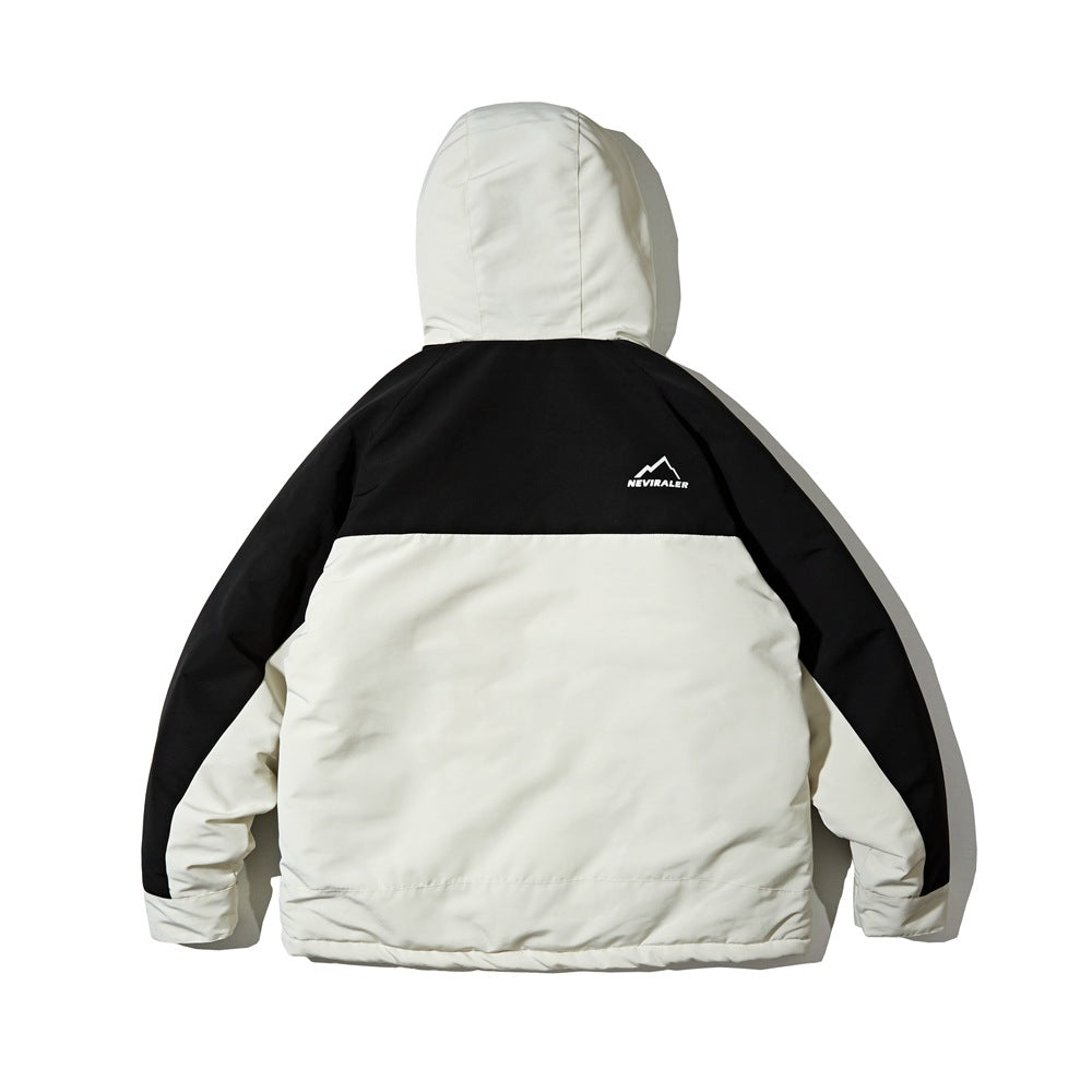 Back view of a hooded jacket with an off-white body and hood, black yoke and sleeves, and a small white logo.