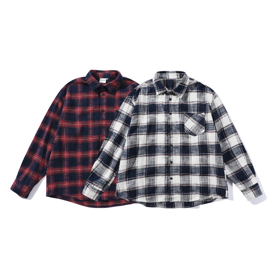 Two flat-lay button-up plaid shirts: one red and navy, the other white, gray and navy.
