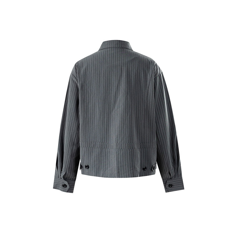 Back view of gray pinstripe jacket showing lower back seam, button tabs at hem and buttoned cuffs