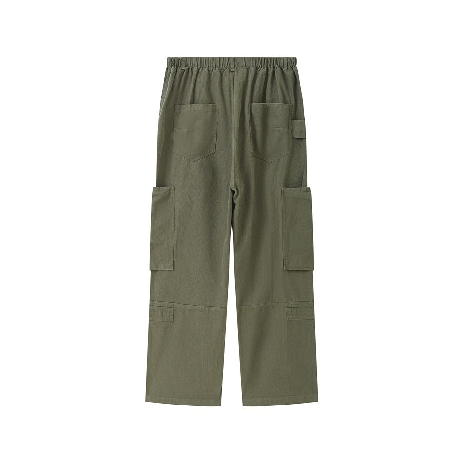 Back view of olive wide-leg cargo pants with an elastic waistband, back pockets, and large cargo pockets.