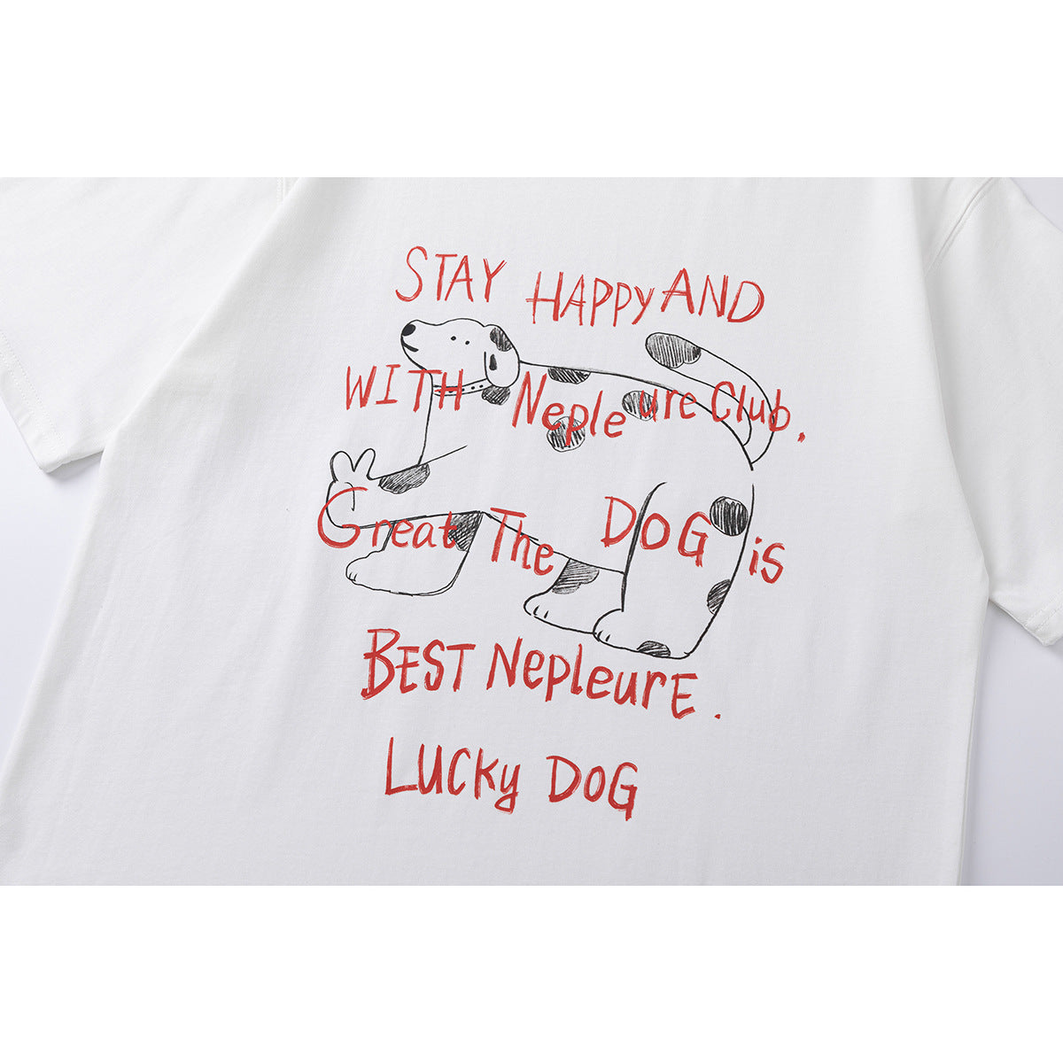 Close-up of a white T-shirt with a black spotted dog illustration and red handwritten English lettering.