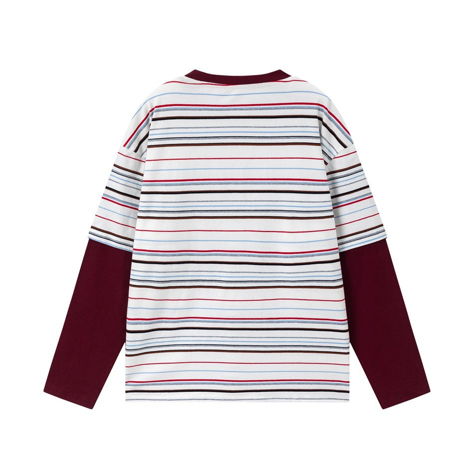 Flat back of a white striped long-sleeve top with burgundy collar and burgundy contrast sleeves