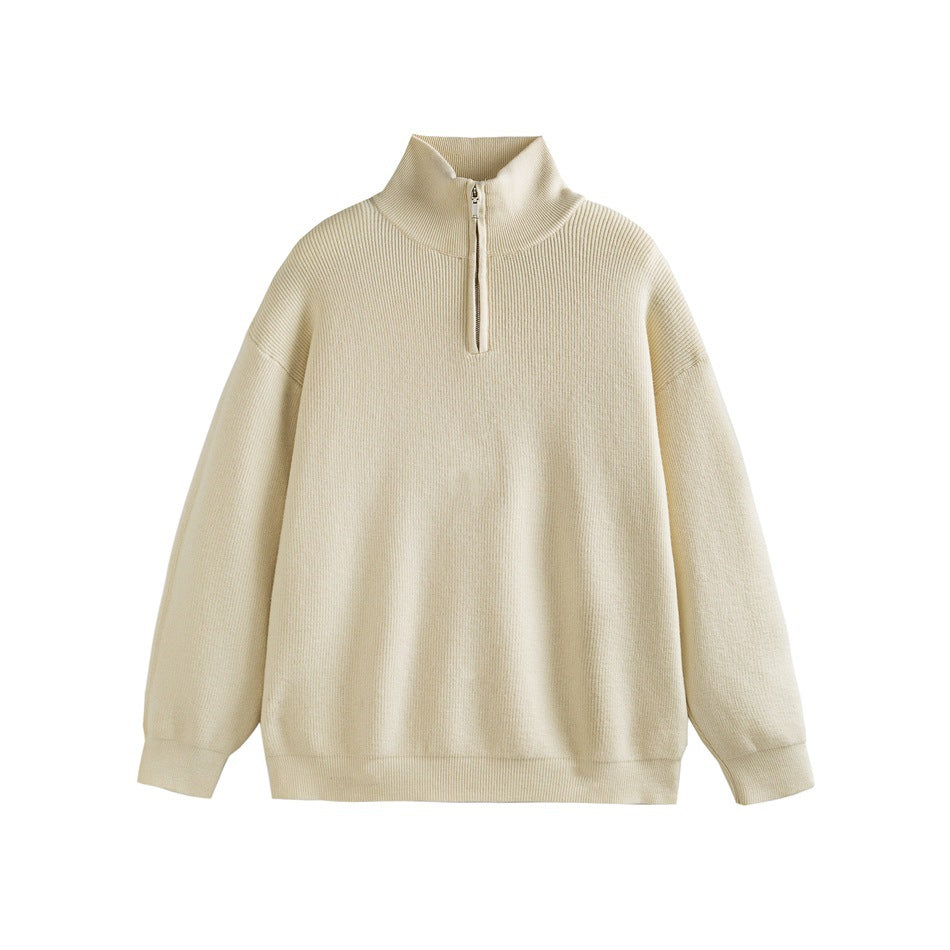 Cream ribbed knit quarter-zip sweater with stand collar, flat lay front view