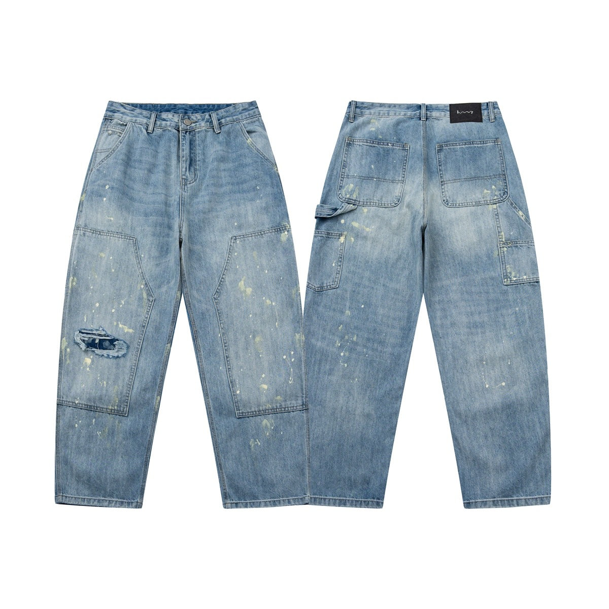 Front and back views of relaxed blue jeans with utility pockets, a frayed knee rip and scattered pale speckles.