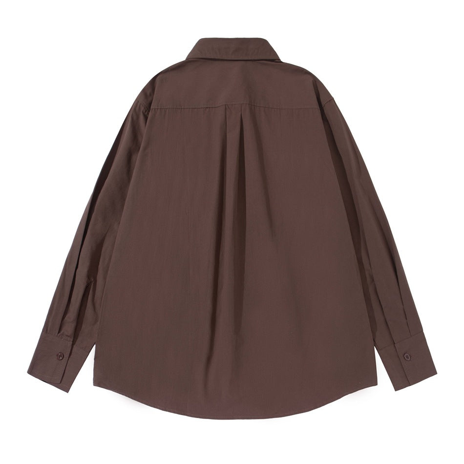 Brown button-up shirt back view with yoke, center pleat and buttoned cuffs, flat lay