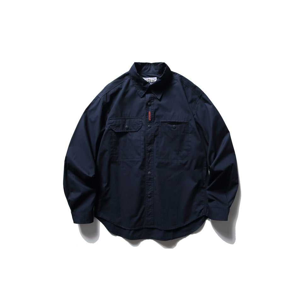 Navy long-sleeve button-front shirt with pointed collar, two chest pockets with snaps and curved hem, flat lay