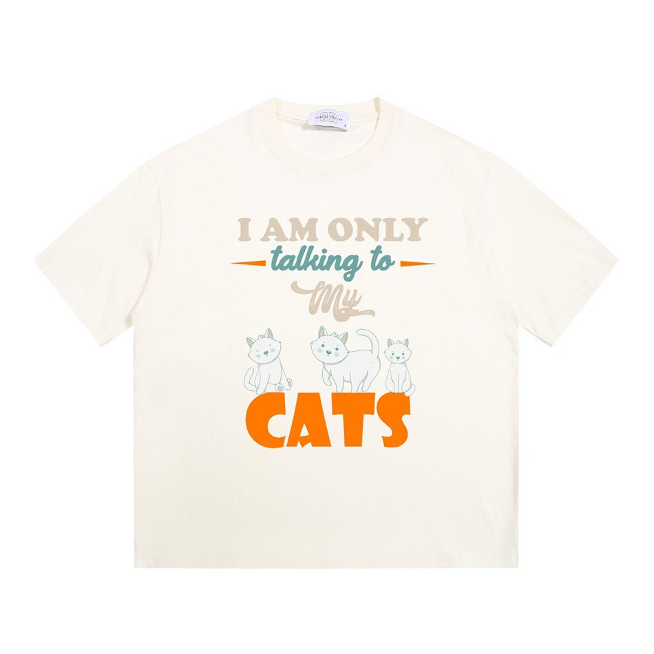 Apricot cream short-sleeve crew-neck T-shirt with 'I AM ONLY talking to My CATS' cat graphic, flat lay