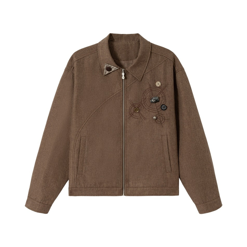 Brown collared zip-front jacket flat view with chest embroidery, attached buttons and plaid collar tab