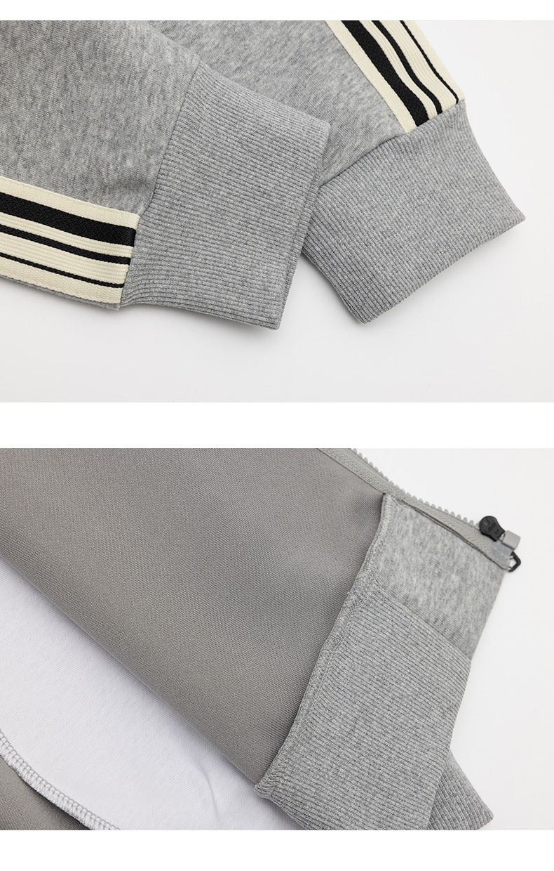 Close-up views of a heather-gray jacket's ribbed cuffs, striped trim, and zipper with the garment turned inside out.