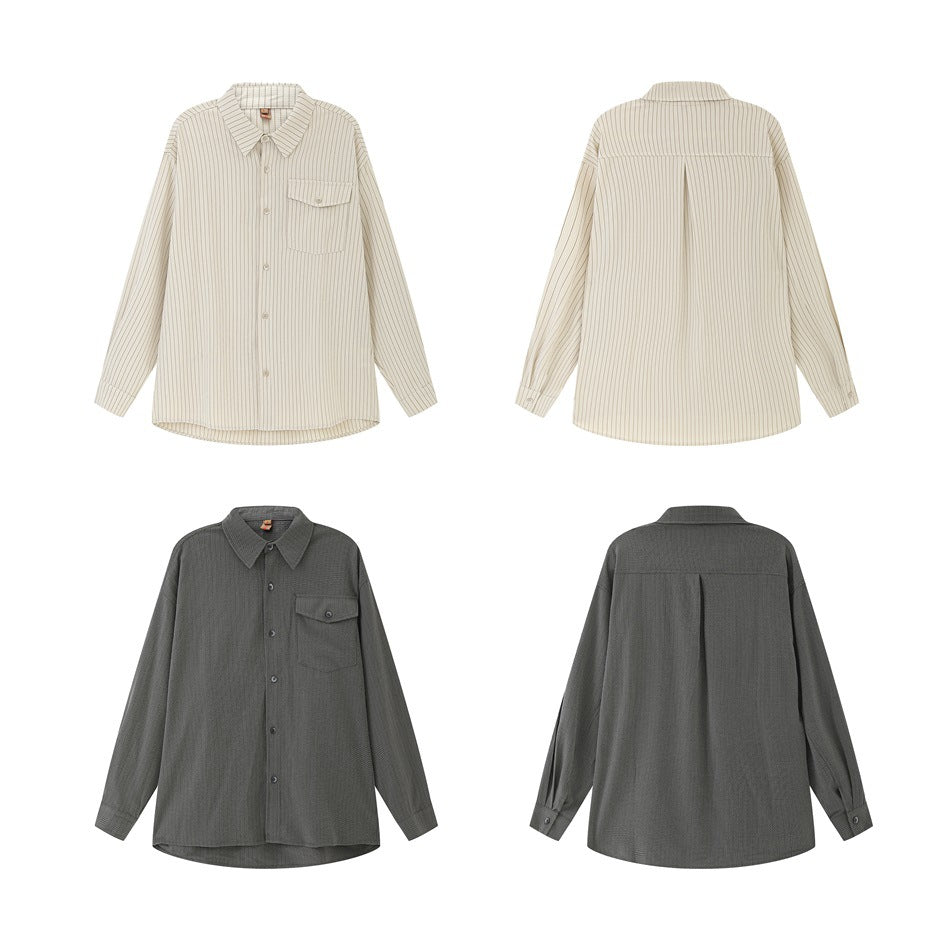 Front and back views of oversized button-up shirts in cream pinstripes and charcoal gray.