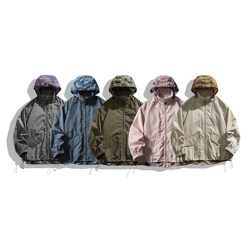 Five hooded zip jackets shown together in charcoal, blue, olive, pale pink, and light beige colorways.