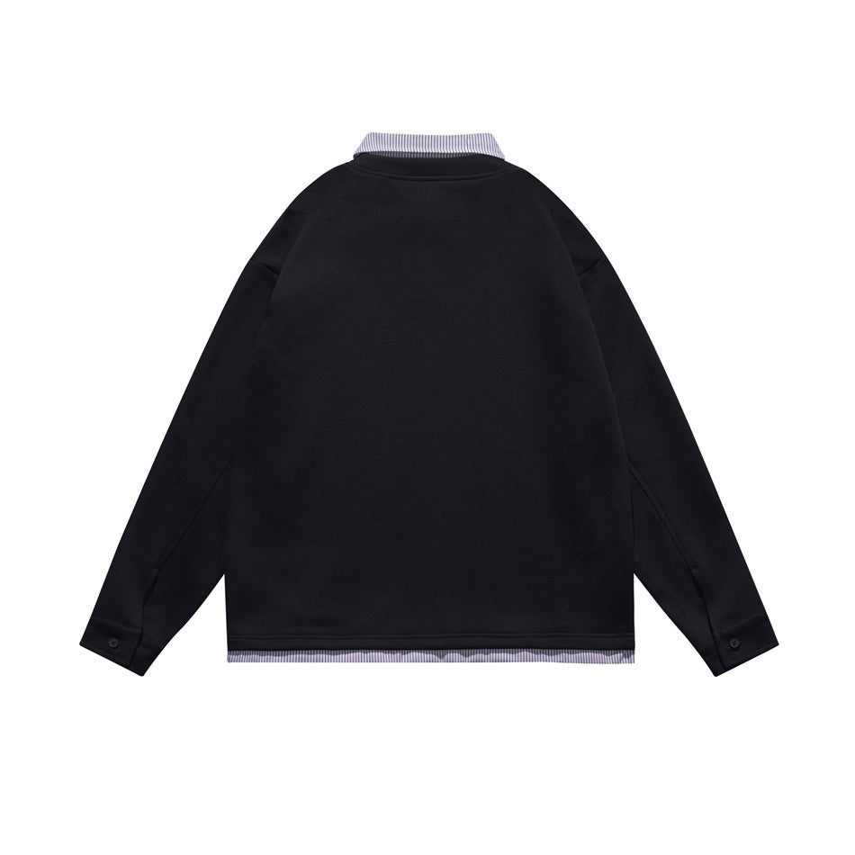 Back view of a black long-sleeve top with striped collar and hem trim.