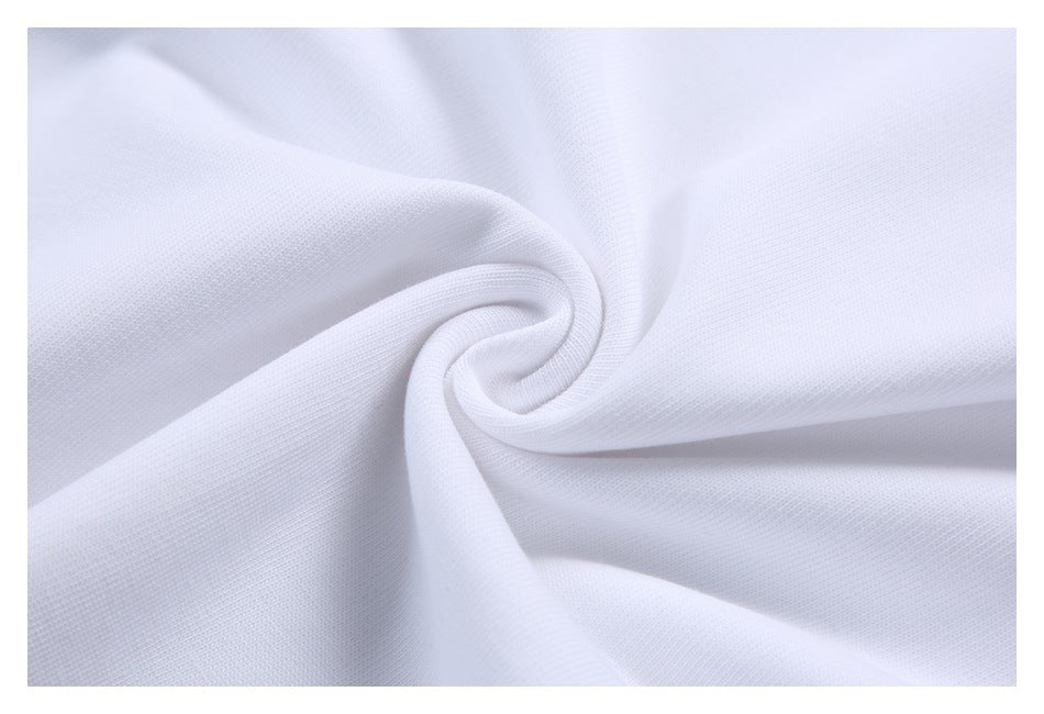 Close-up of white fabric gathered into a swirl, showing its surface texture and drape.