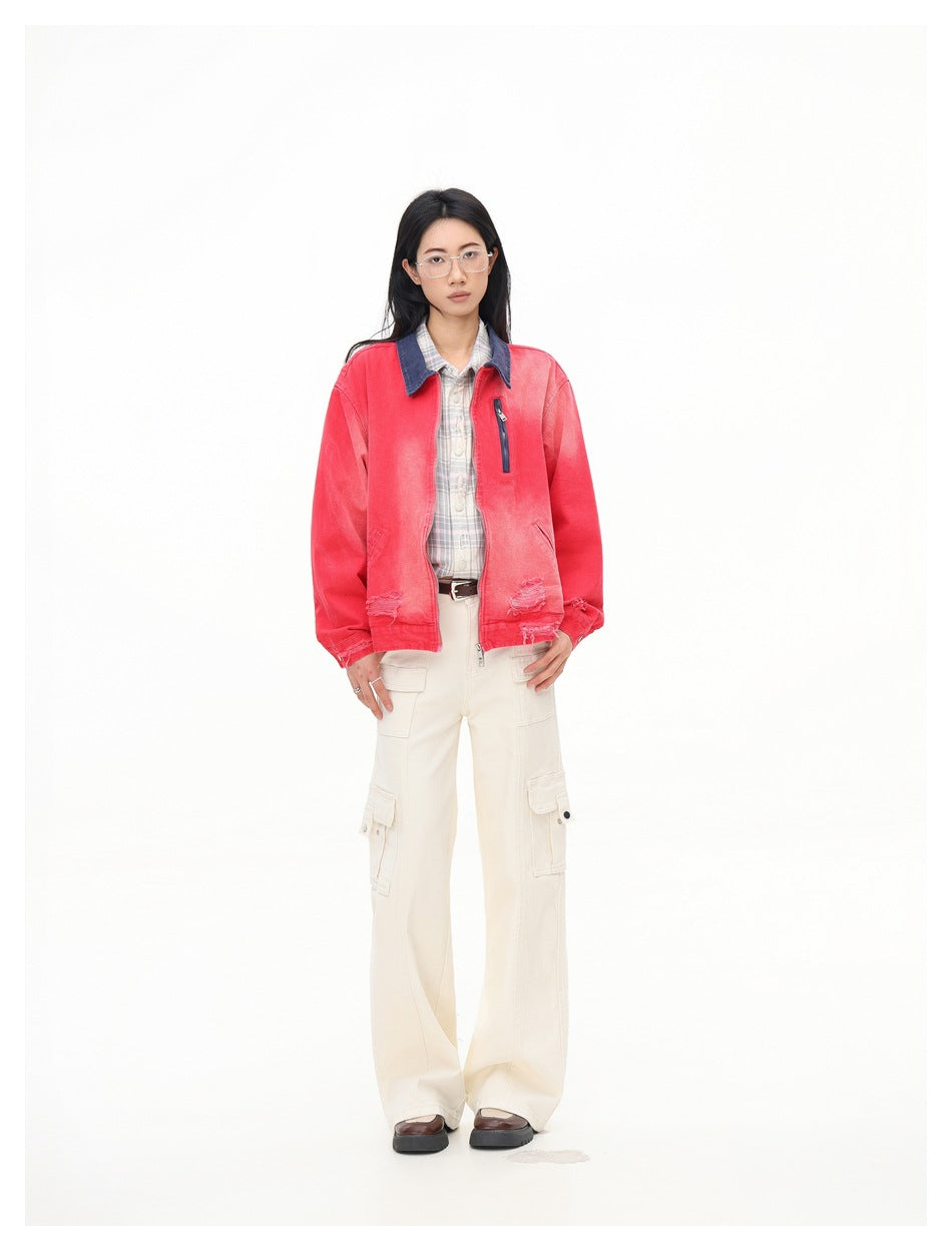 Full-length front view of a model wearing a faded red jacket with a dark blue collar and chest zip pocket.