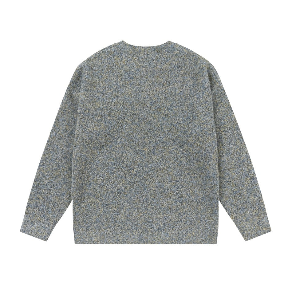 Flat lay of the plain back of a blue-gray marled sweater with a crew neck and long sleeves.