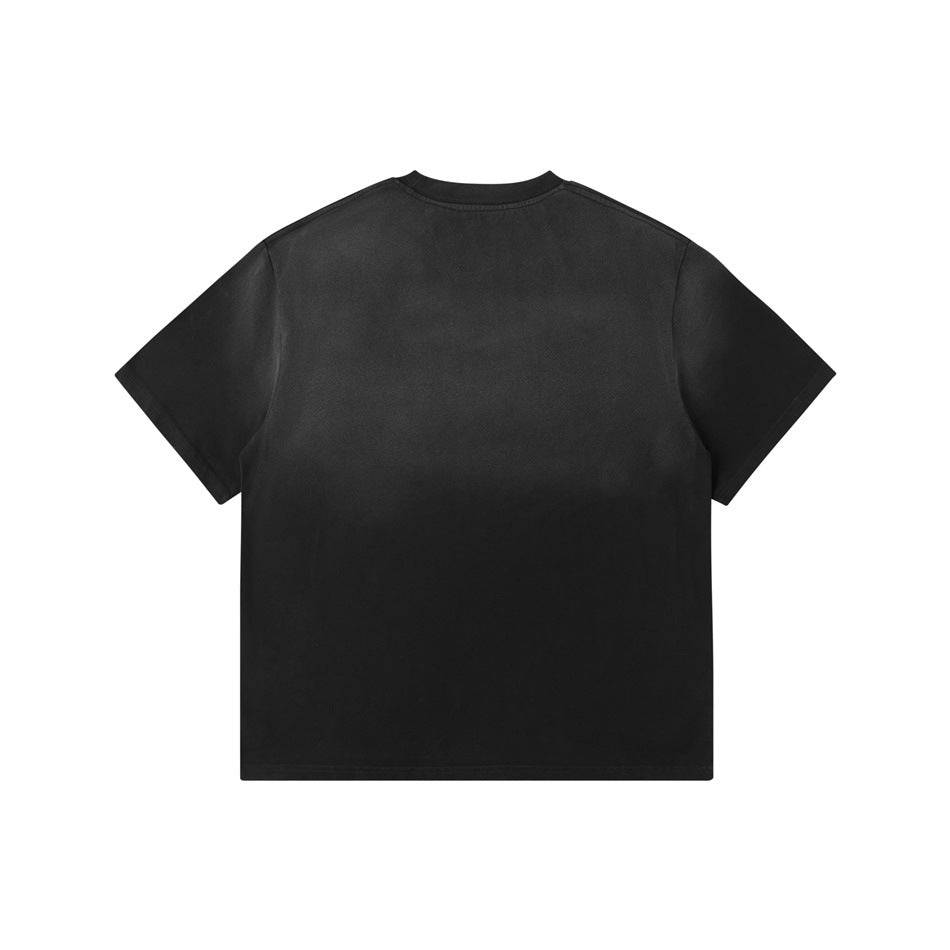 Back view of a plain black short-sleeve crew-neck T-shirt laid flat on a white background.
