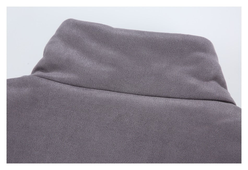 Close-up of gray fabric with a broad curved folded edge.