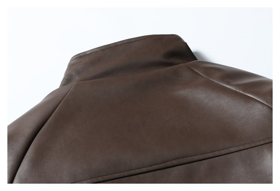 Close-up of the dark brown jacket's back collar and shoulder seam.