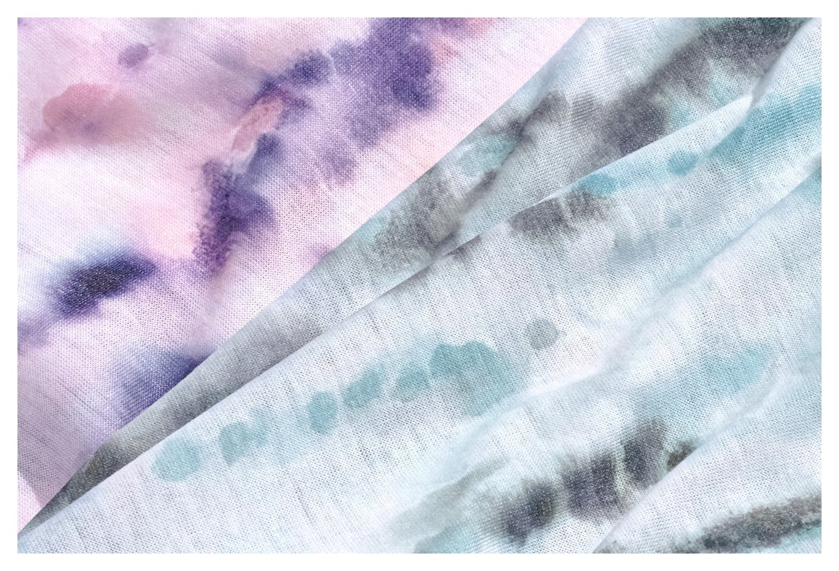 Overlapping fabric in pink-purple and pale aqua-gray tie-dye colorways.