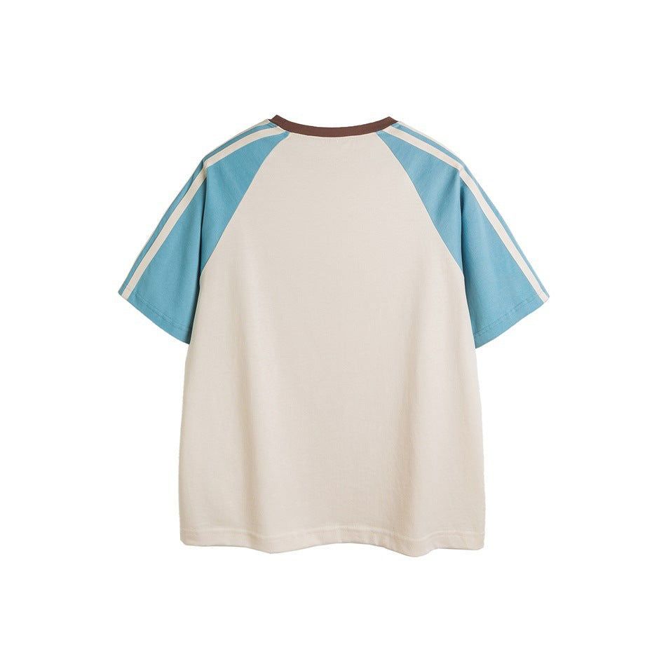 Back view of a cream T-shirt with blue raglan sleeves, cream sleeve stripes and a brown neckband