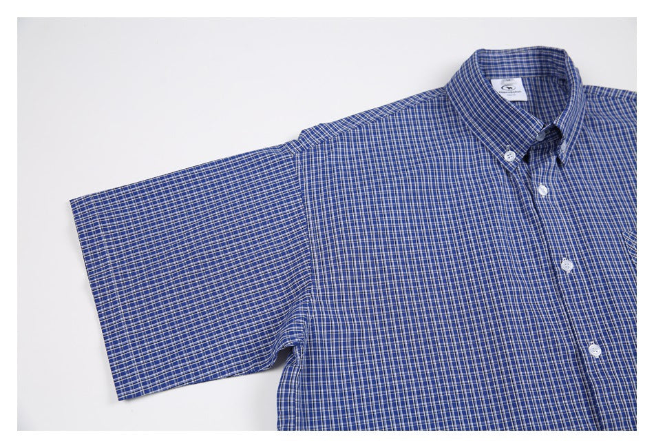 Flat-lay view of a blue-and-white checked short-sleeve button-up shirt.
