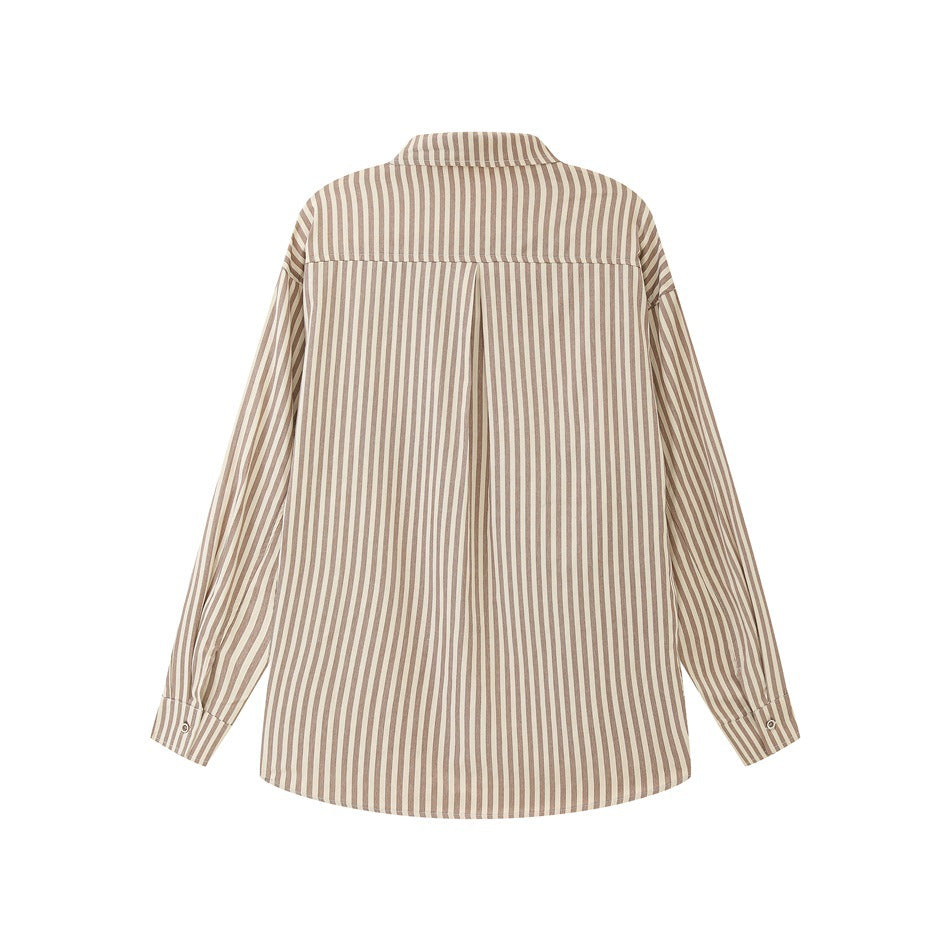 Back view of a beige-and-white vertically striped long-sleeve shirt with a center pleat and button cuffs.