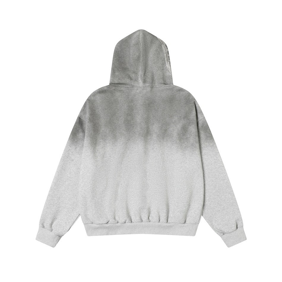 Back view of heather gray hoodie with dark gradient fade from the hood and shoulders and ribbed hem