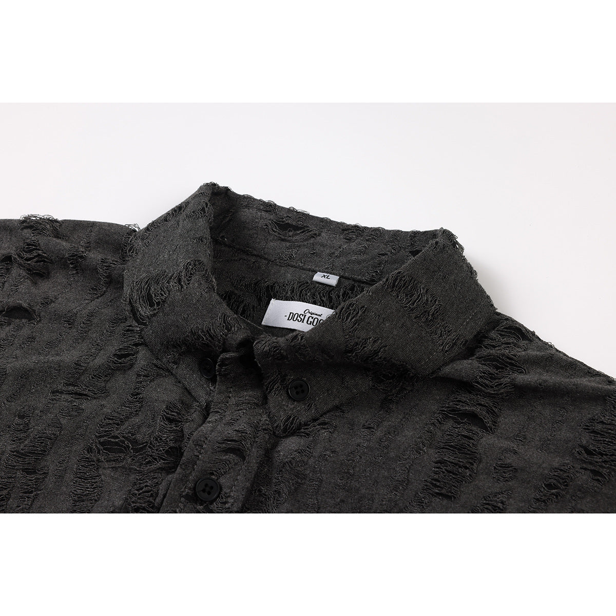 Close-up of a charcoal shirt collar, button placket, and textured distressed stripe pattern.