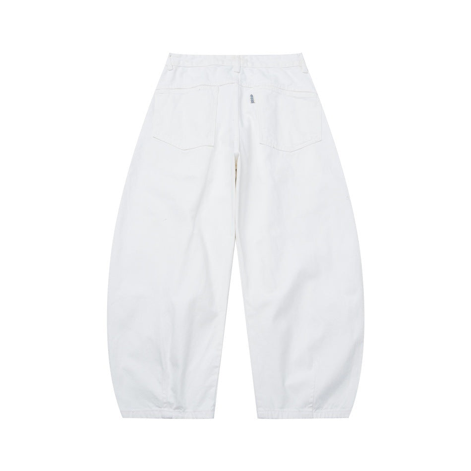White wide-leg barrel pants, back view, with two patch pockets and a curved leg shape
