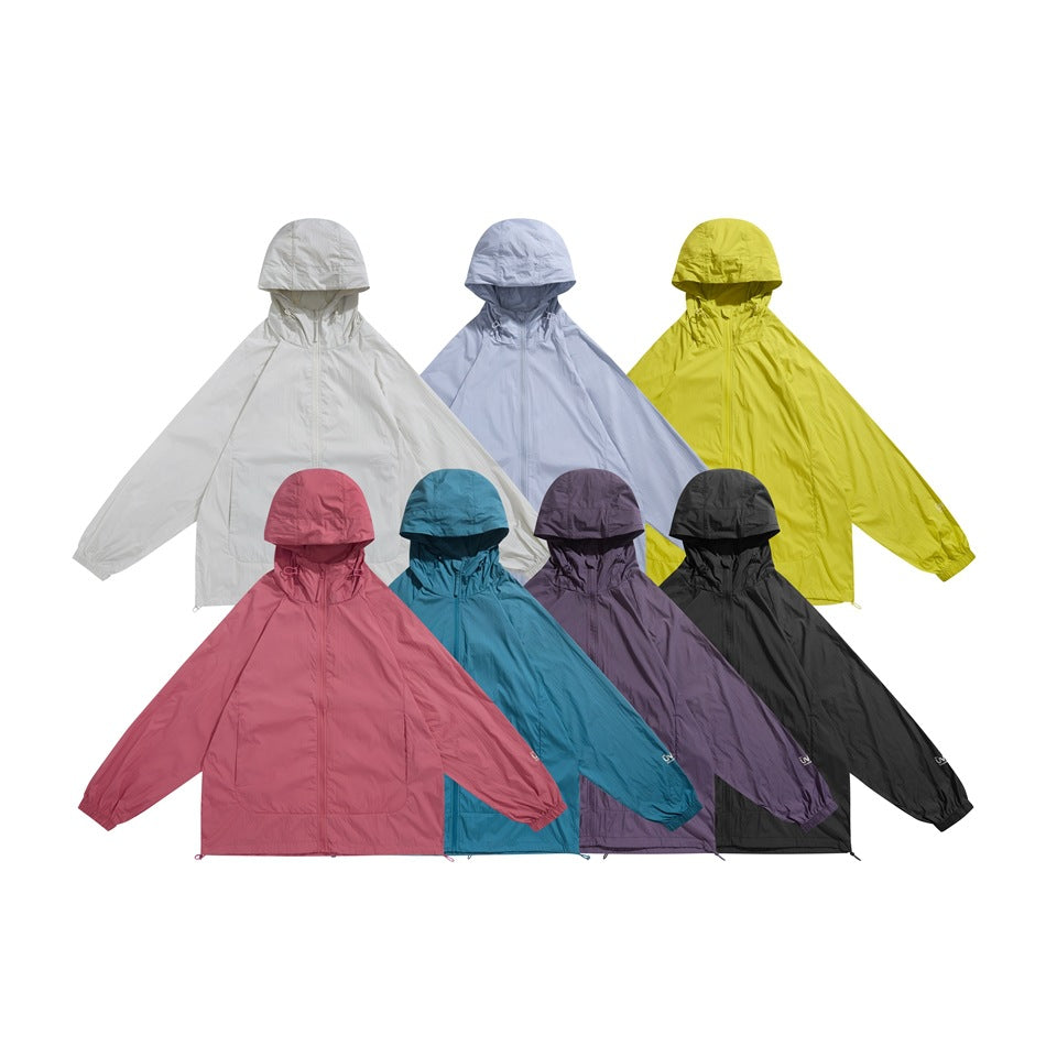 Seven hooded jackets displayed together in white, pale blue, yellow, rose, teal, purple, and black.
