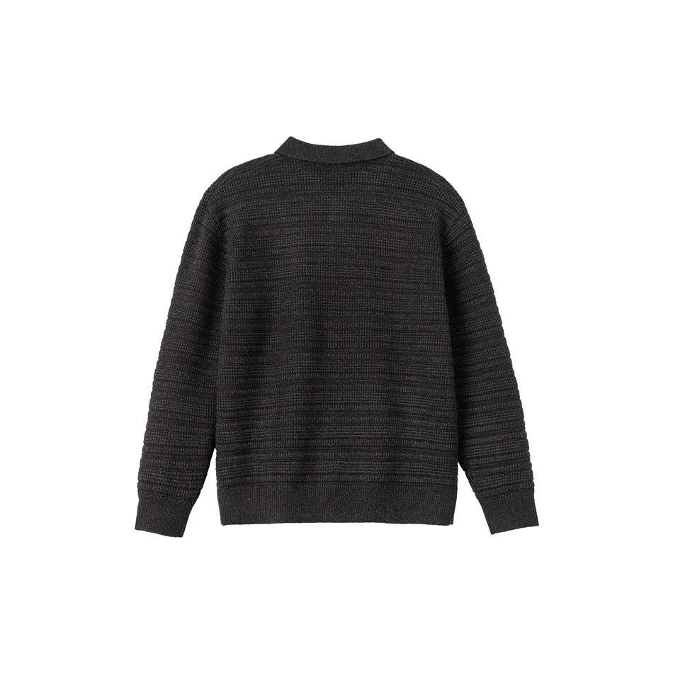 Back view of a dark charcoal textured knit cardigan with a collar, long sleeves, and ribbed cuffs and hem.
