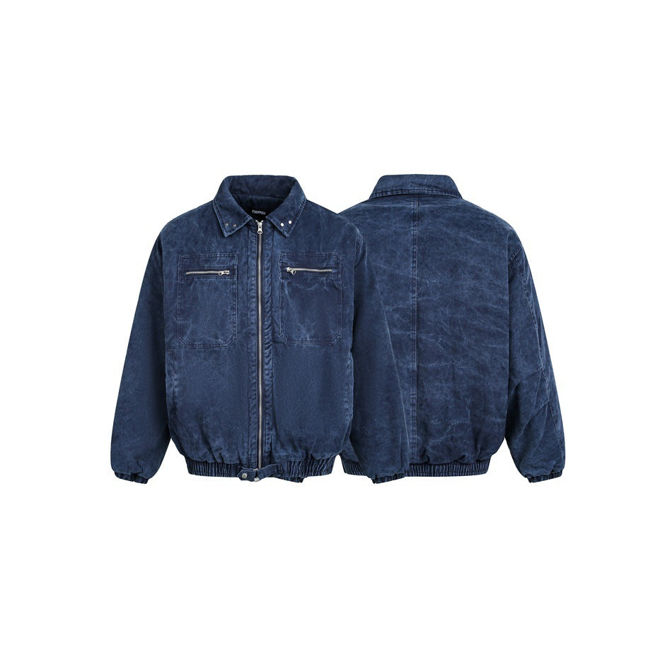 Navy washed jacket shown from the front and back, with a zip front, pointed collar, two zip chest pockets, and elastic hem.