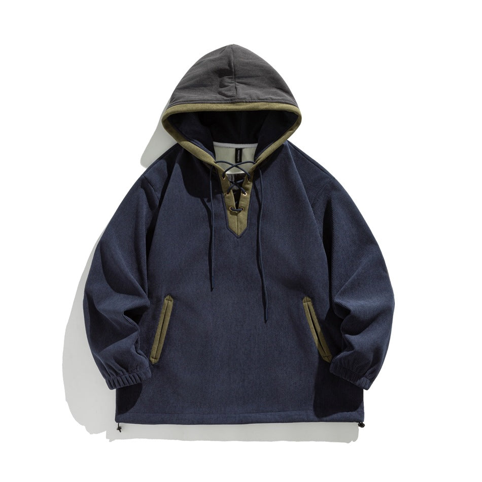 Navy blue ribbed hoodie with gray hood, olive lace-up V-neck, olive-trimmed pockets and hem toggles, flat lay